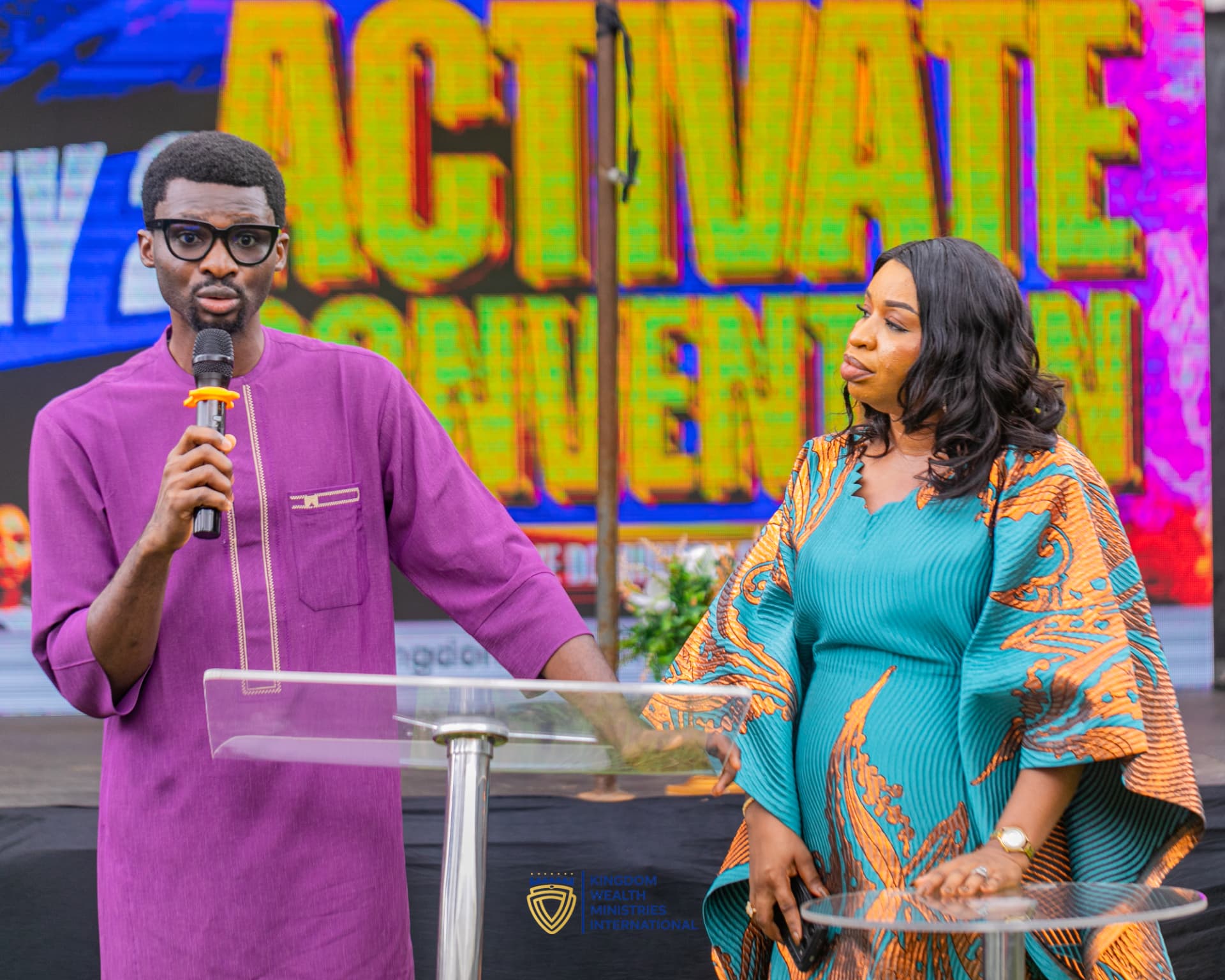 Apostle Just Ibe ministering alongside a guest speaker at the Activate Convention