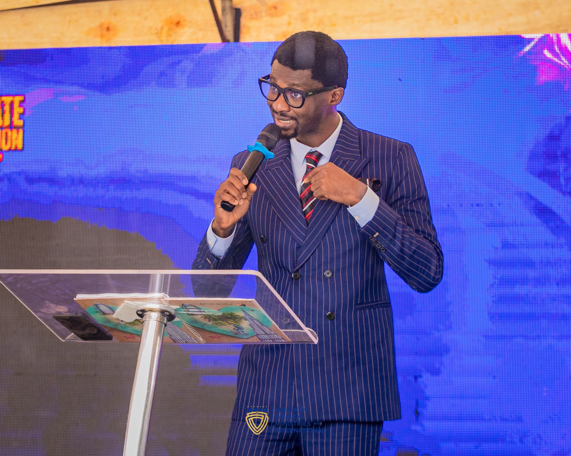 KWMI minister preaching from the pulpit at the Activate Convention