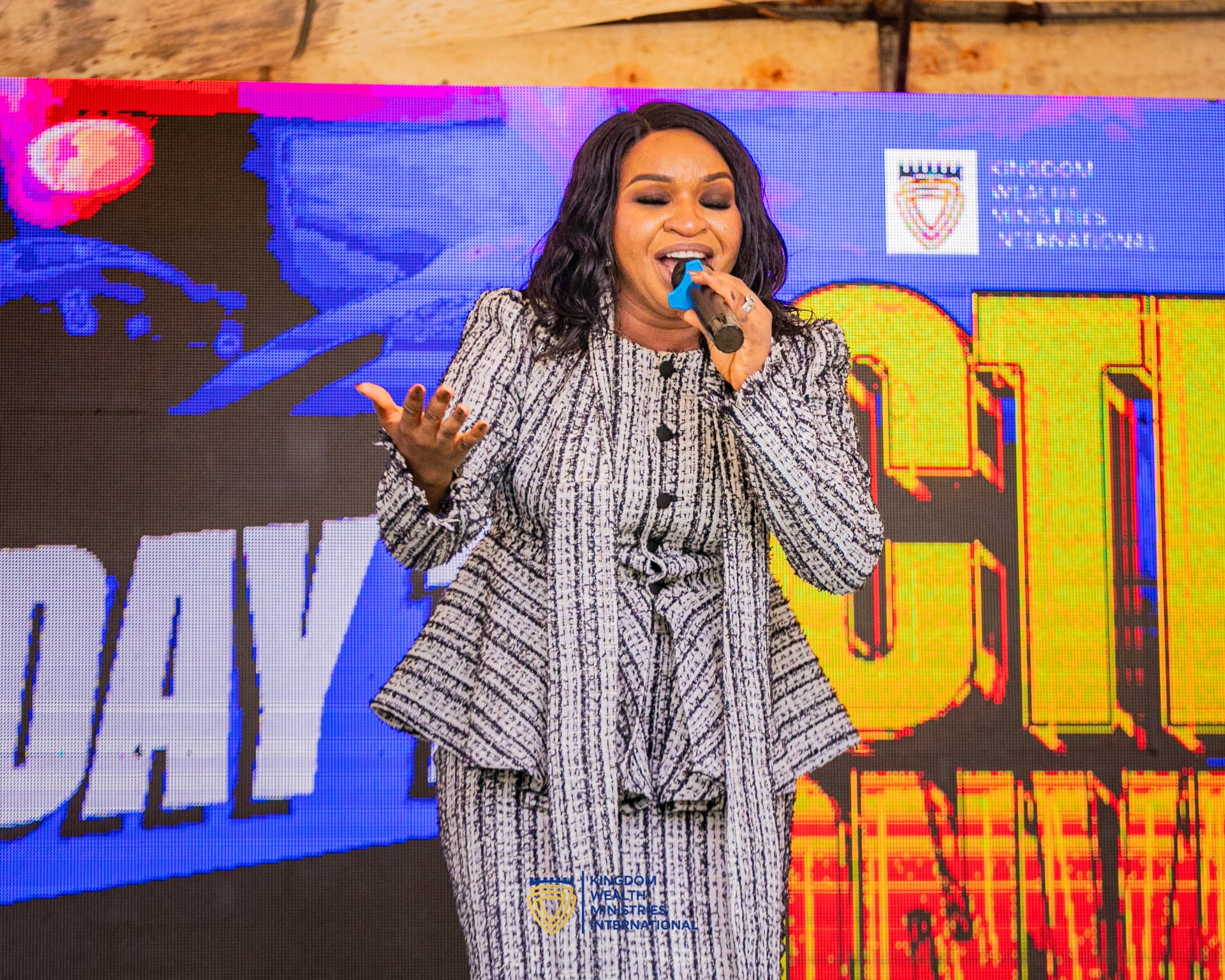 A psalmist ministering in song at the Activate Convention